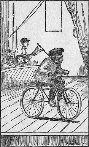 He rode around a little wooden platform on the bicycle,
holding a flag over his shoulder. (Page 99)