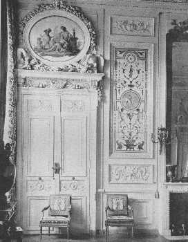 A beautiful doorway in the bedroom of the Empress,
Compi&egrave;gne. The fastening shows how much thought was expended on small
matters, so the balance of decoration would be kept. The chairs are
Louis XVI.