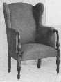 A wing-chair with a painted frame is comfortable and
harmonizes with painted furniture.