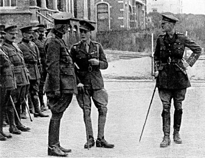 THE PRINCE OF WALES SPEAKING WITH BELGIAN OFFICERS AT LA PANNE,
BELGIUM