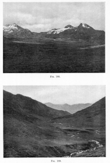 Fig. 188&mdash;Asymmetrical peaks in the Central Ranges
between Antabamba and Lambrama. The snow-filled hollows in the
photograph face away from the sun&mdash;that is, south&mdash;and have retained
snow since the glacial epoch; while the northern slopes are snow-free.
There is no true glacial ice and the continued cirque recession is due
to nivation.