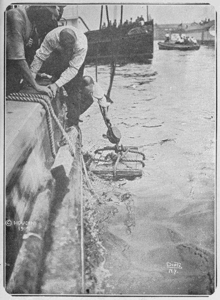 Packing case containing six
hundred pounds of iron weights and Houdini, as it was dropped into New
York Bay