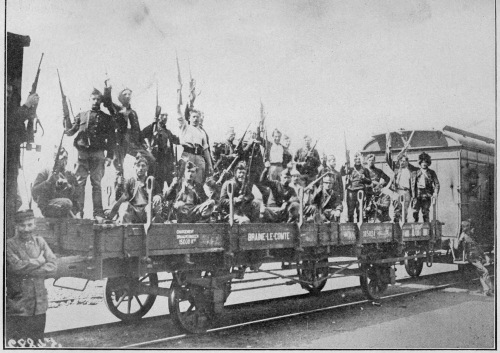 BELGIAN SOLDIERS LEAVING FOR THE FRONT. ALL KINDS OF
ROLLING STOCK WERE REQUISITIONED FOR THIS PURPOSE.

Photo by International News Service.
