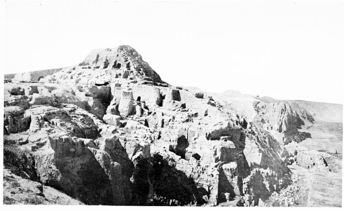 Fig. 136.&mdash;ḲAL’ÂT SHERGÂT, THE ZIGURRAT AND RUINS OF
NORTH WALL.