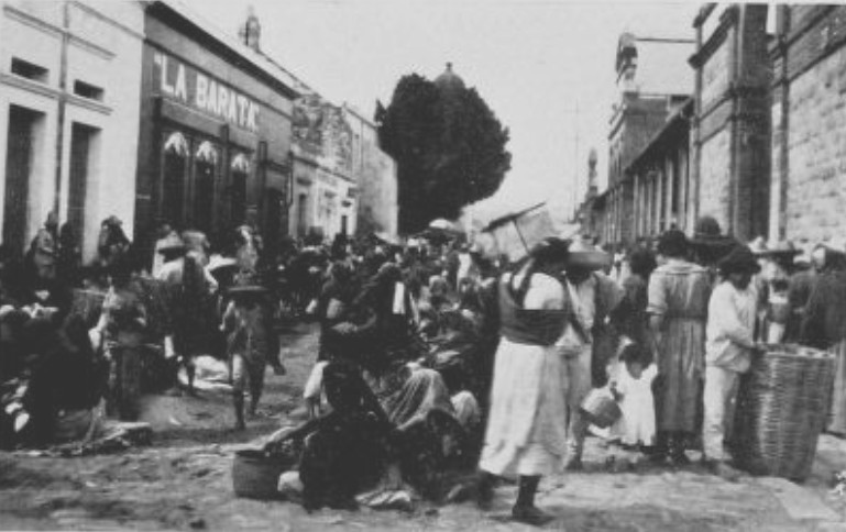 THE MEXICAN PEON SO LOVES THE EXCITEMENT OF THE MARKET
THAT HE REFUSES TO SELL HIS GOODS ELSEWHERE